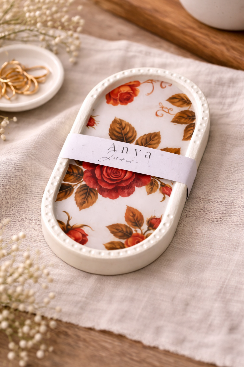 Vintage rose floral trinket dish styled on linen with jewellery and soft neutral decor